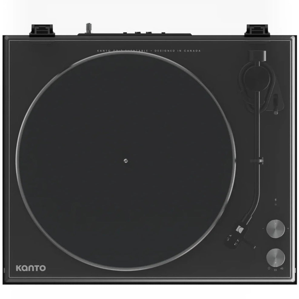 Top-down view of the Kanto Audio OBI3 turntable with a black cover and sleek design.