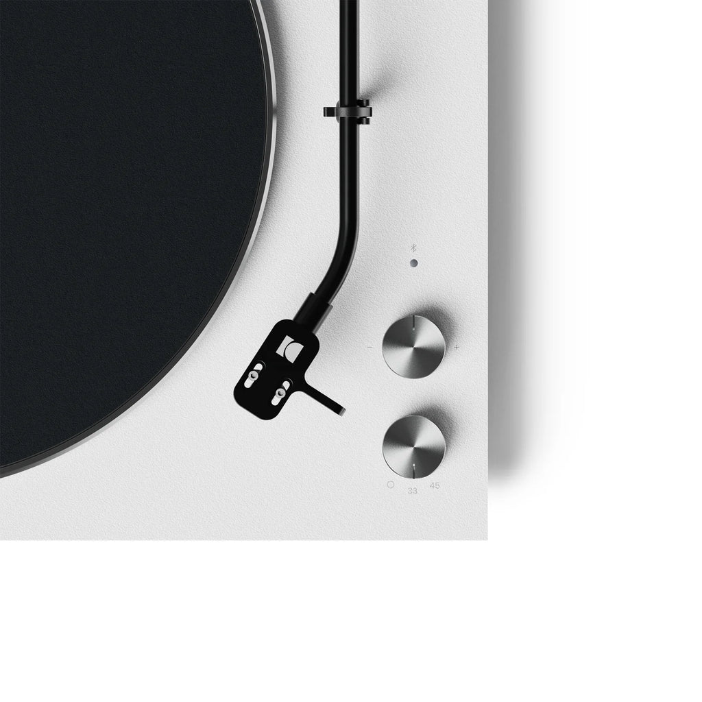Close-up of the Kanto Audio OBI3 turntable knob showing sleek design and control features.