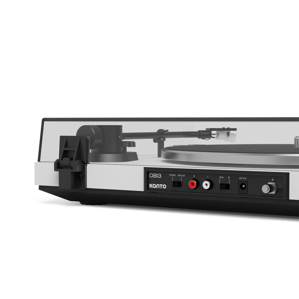 Kanto Audio OBI3 turntable with black and white vinyl record, showing rear and key control details on the turntable.