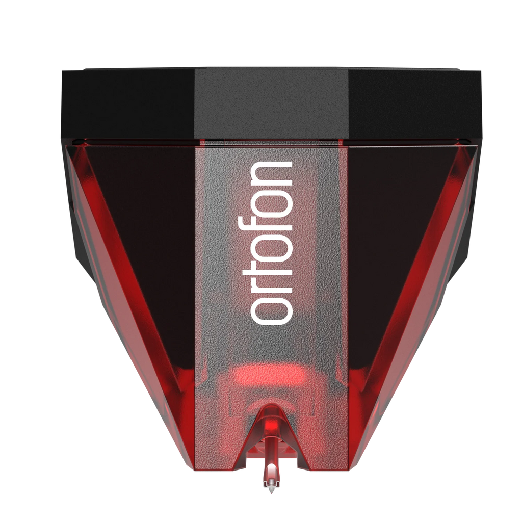 Ortofon 2M Red turntable cartridge with red stylus, detailed front view showing cartridge body and stylus tip.