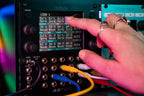 1010music Bitbox MK2 semi-modular synthesizer with knobs, buttons, and LED display for electronic music production.