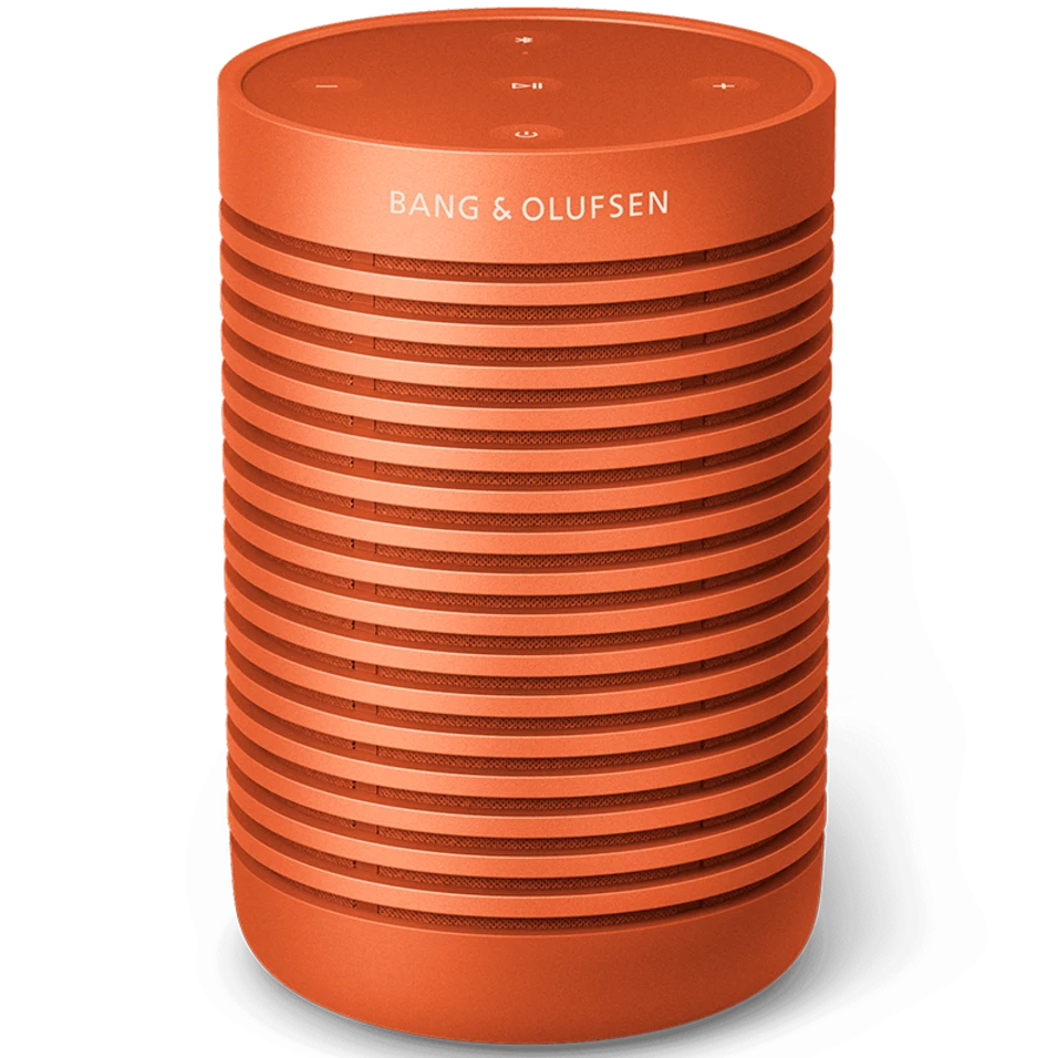 Bang & Olufsen Beosound Explore portable speaker in Bonfire Orange, showing its rugged design and compact size.
