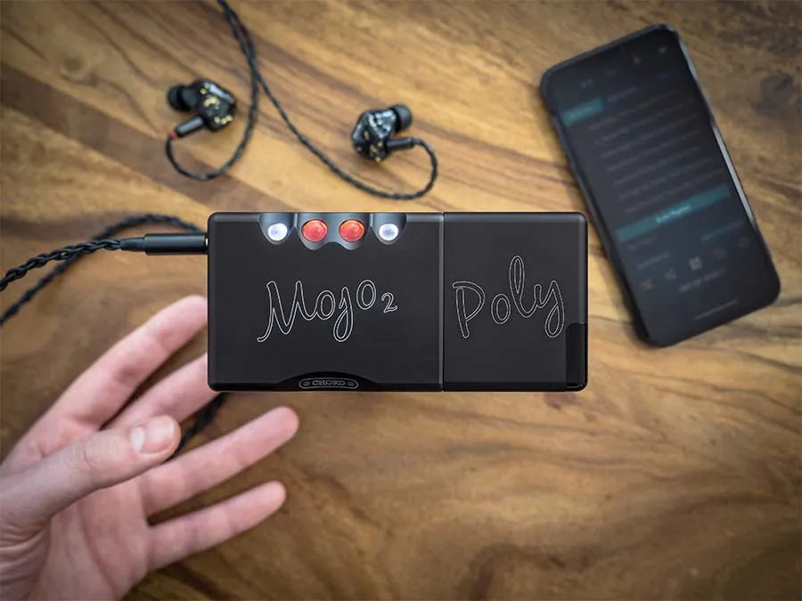 Chord Electronics Poly music streamer with sleek black design, featuring multiple ports and control buttons for high-quality streaming.
