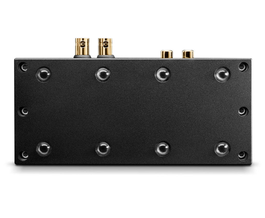 Chord Electronics Qutest headphone amplifier and DAC with a sleek bottom view showing ports and metal casing.