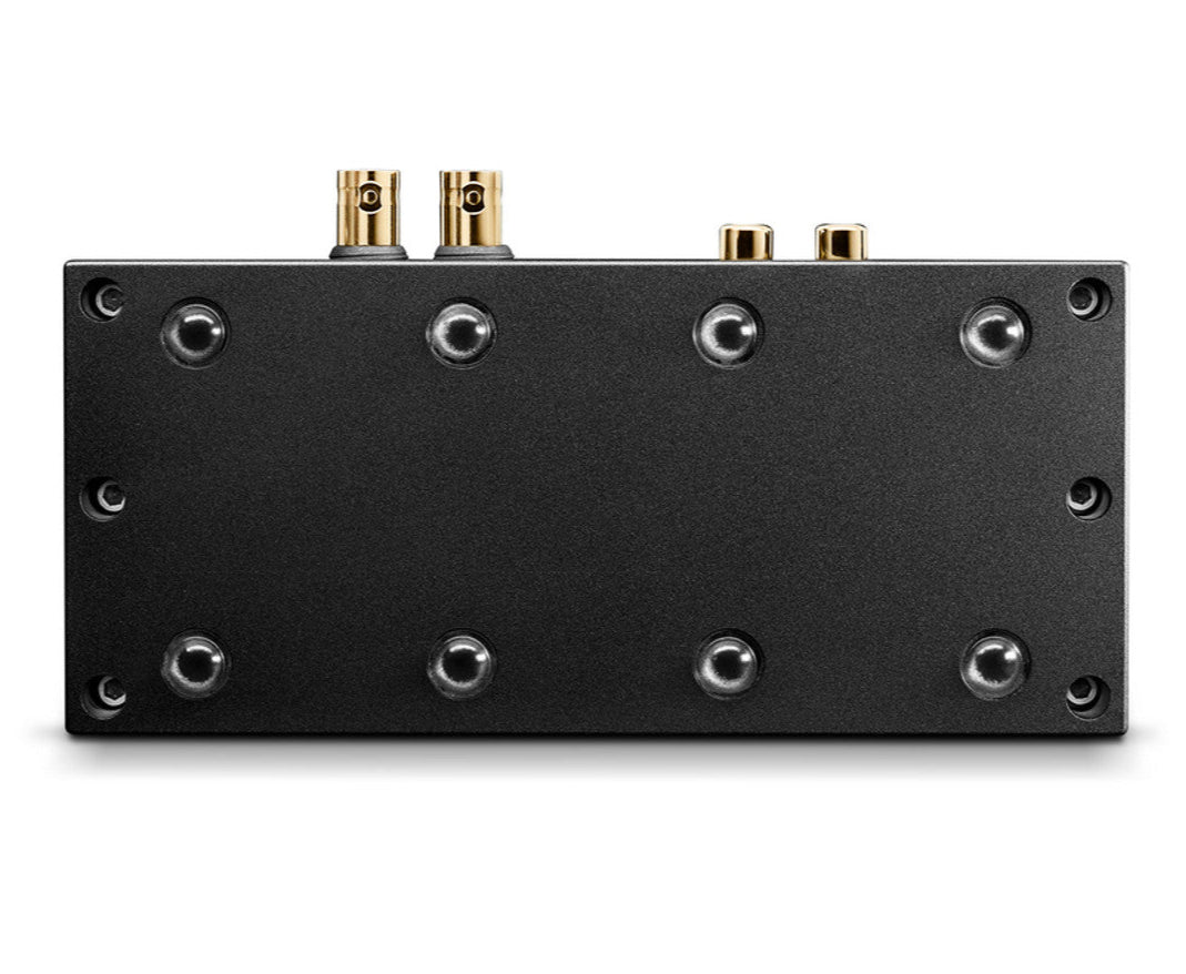 Chord Electronics Qutest headphone amplifier and DAC with a sleek bottom view showing ports and metal casing.