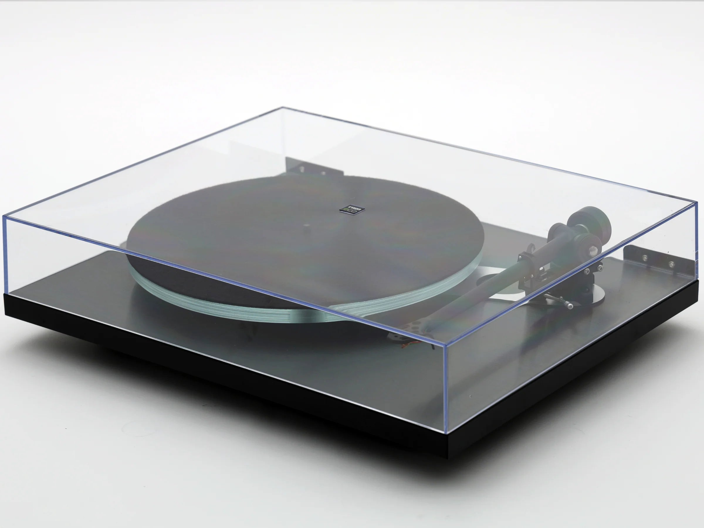 Rega Planar 3 Eco Special turntable with wooden plinth and tonearm, showcasing its sleek design and premium audio components.