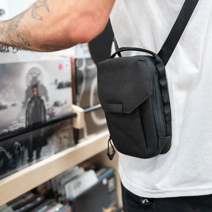 Wandrd X1 Cross Body bag designed for video equipment, featuring durable material and compact design for easy carrying and organization.