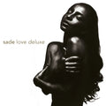 Black vinyl LP of Sade's Love Deluxe album, reissued in 2024, featuring jazz, soul, and funk music on Epic Records.