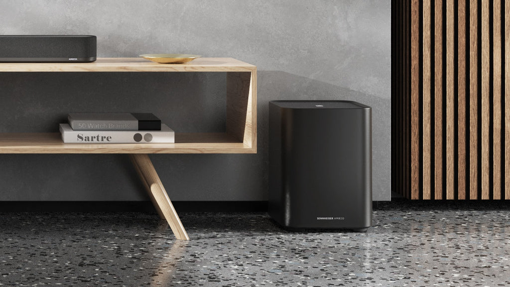 Sennheiser Ambeo Subwoofer for immersive home theater, showing the sleek black subwoofer with control panel and connection ports
