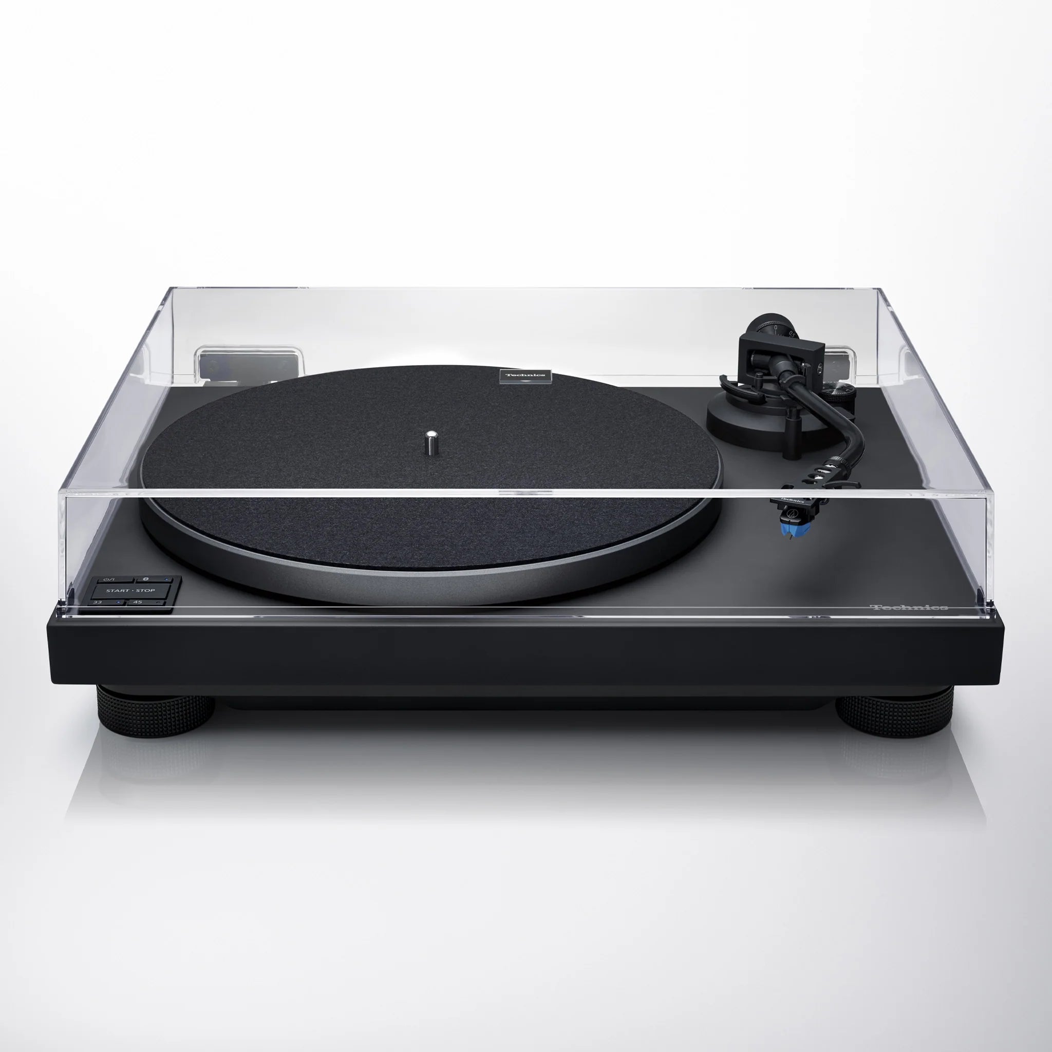 Technics SL-40CBT turntable with black dust cover and tonearm, showcasing its vintage audio equipment design.
