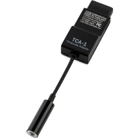 Zoom TCA-1TC-6 recorder accessory cable connected to Zoom TCA-1 audio recorder, showing detailed connectors and compact design.