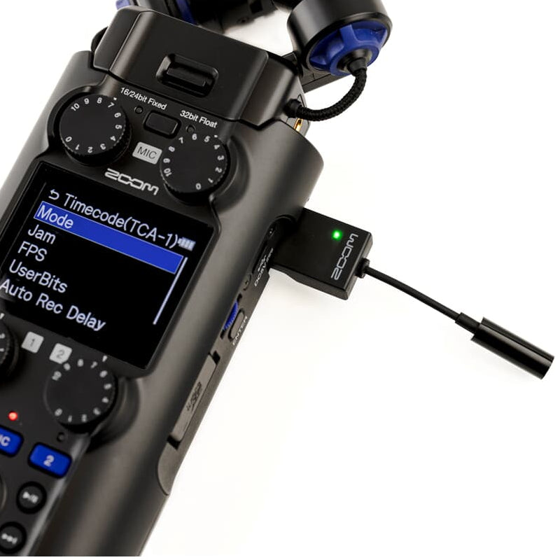Zoom TCA-1 recorder accessory with cable and connectors, designed for professional audio recording equipment.