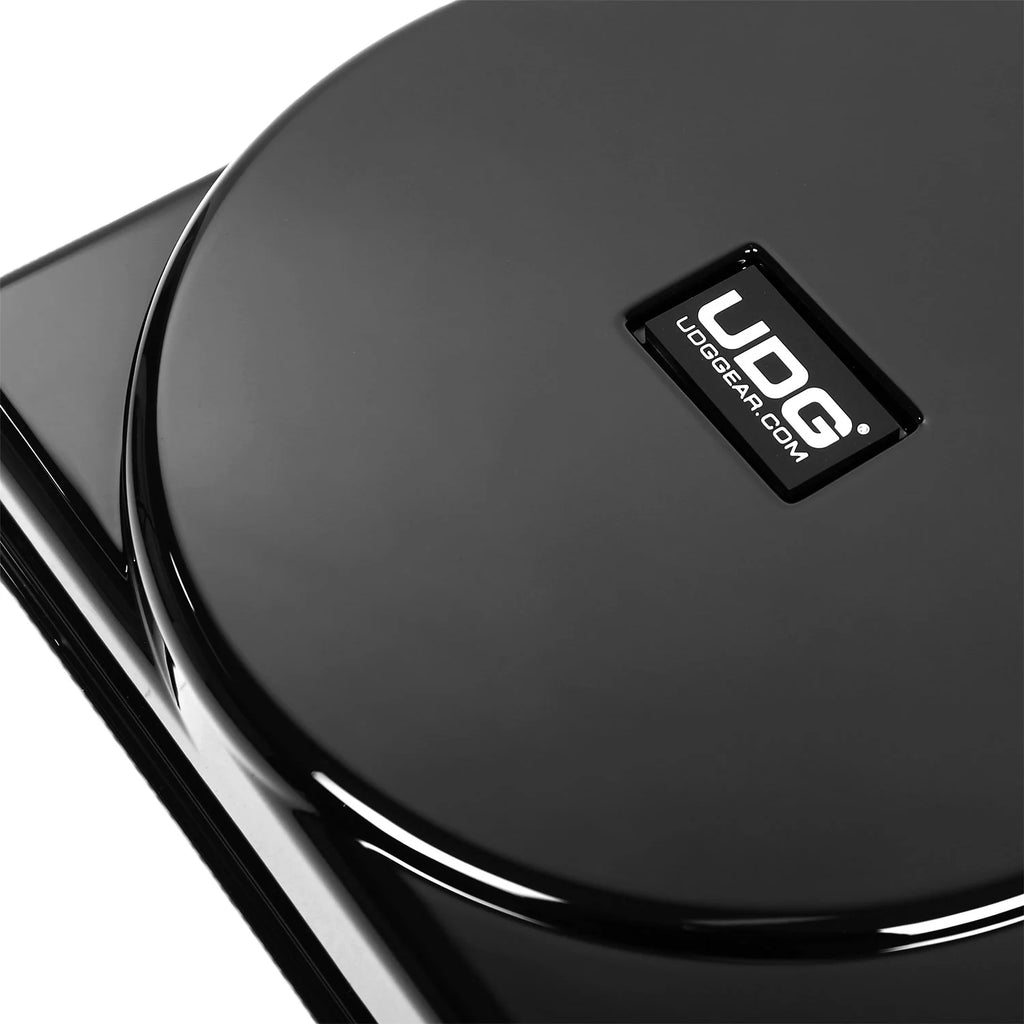 UDG Ultimate turntable DJ cover for SL-1200 and PLX-CRSS12 turntables, showing a sleek black protective equipment cover.