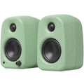 Kanto Audio UKI desktop speakers shown from front perspective, compact design with black finish and control knobs on top.