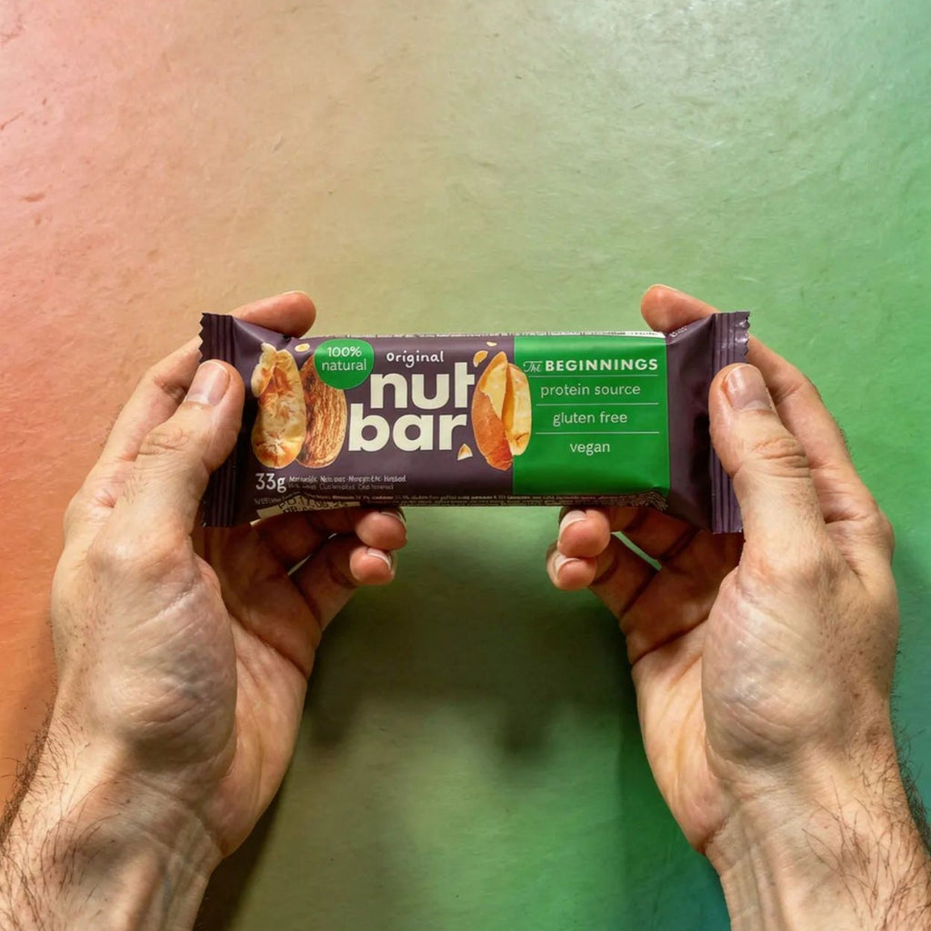 The Beginnings Original Nut & Seed Bar featuring mixed nuts and seeds in a natural, wholesome snack bar.