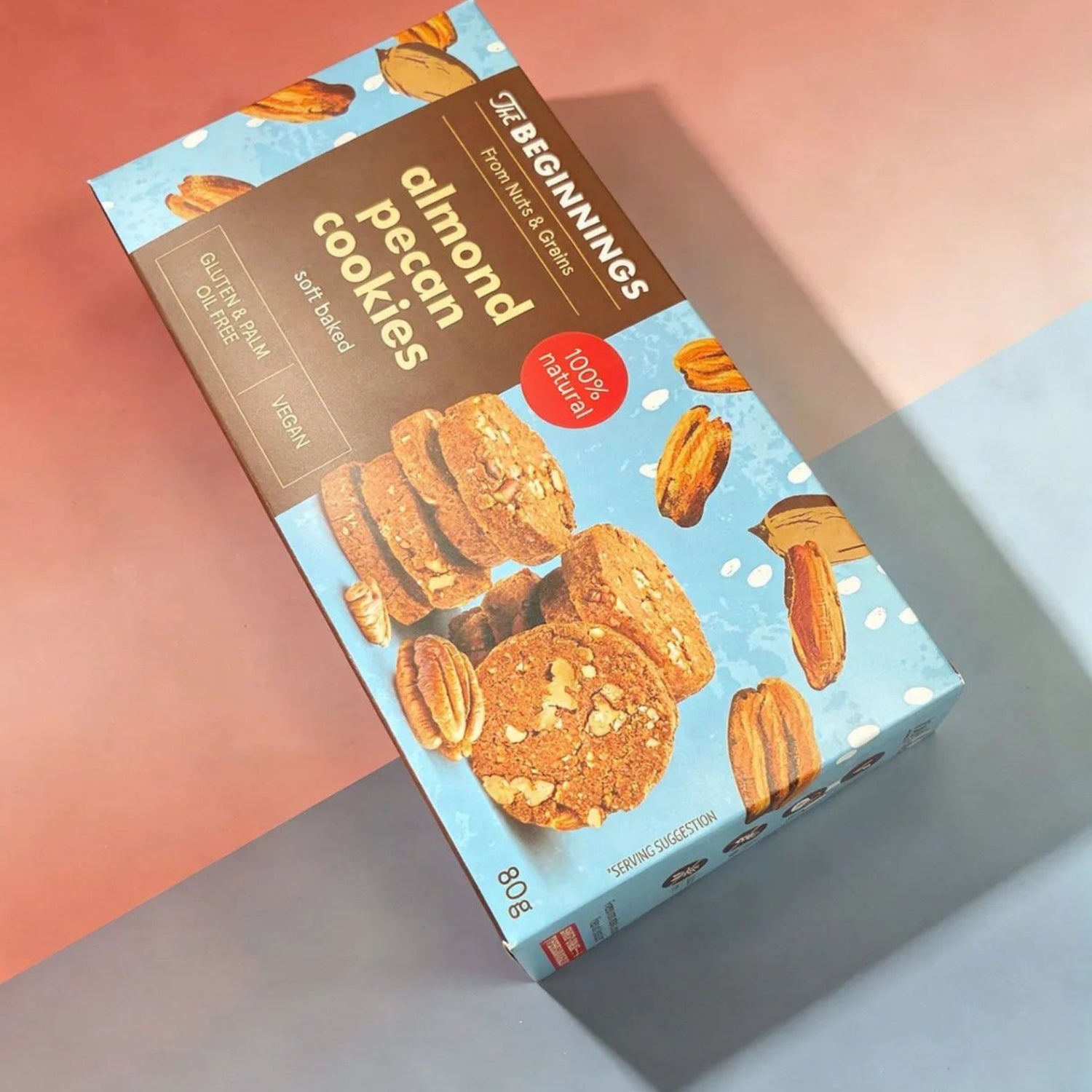 Illustration of The Beginnings Almond & Pecan Cookies showing cookies with almond and pecan pieces on top.