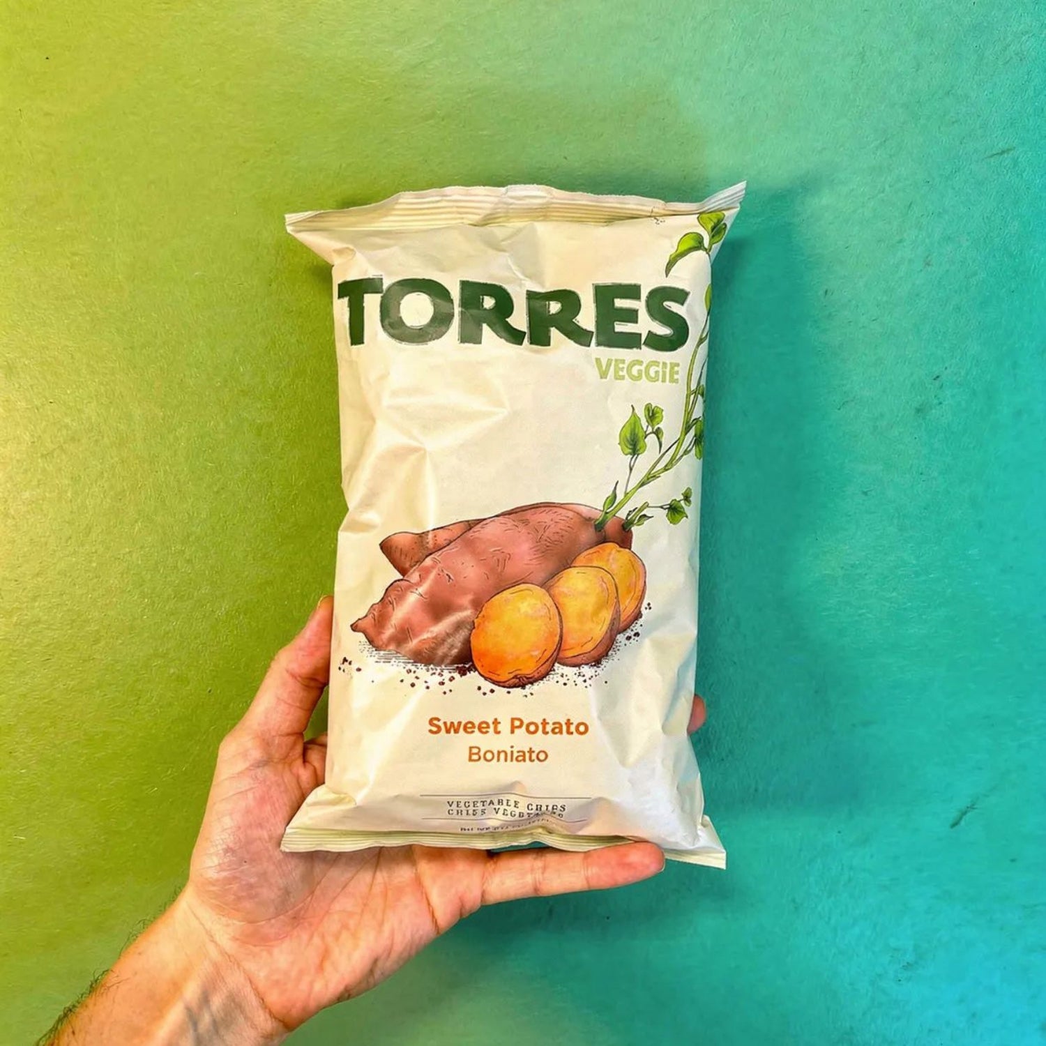 Sweet potato chips from Patatas Torres Veggie brand, showing crispy, golden sweet potato slices in a 90g bag.