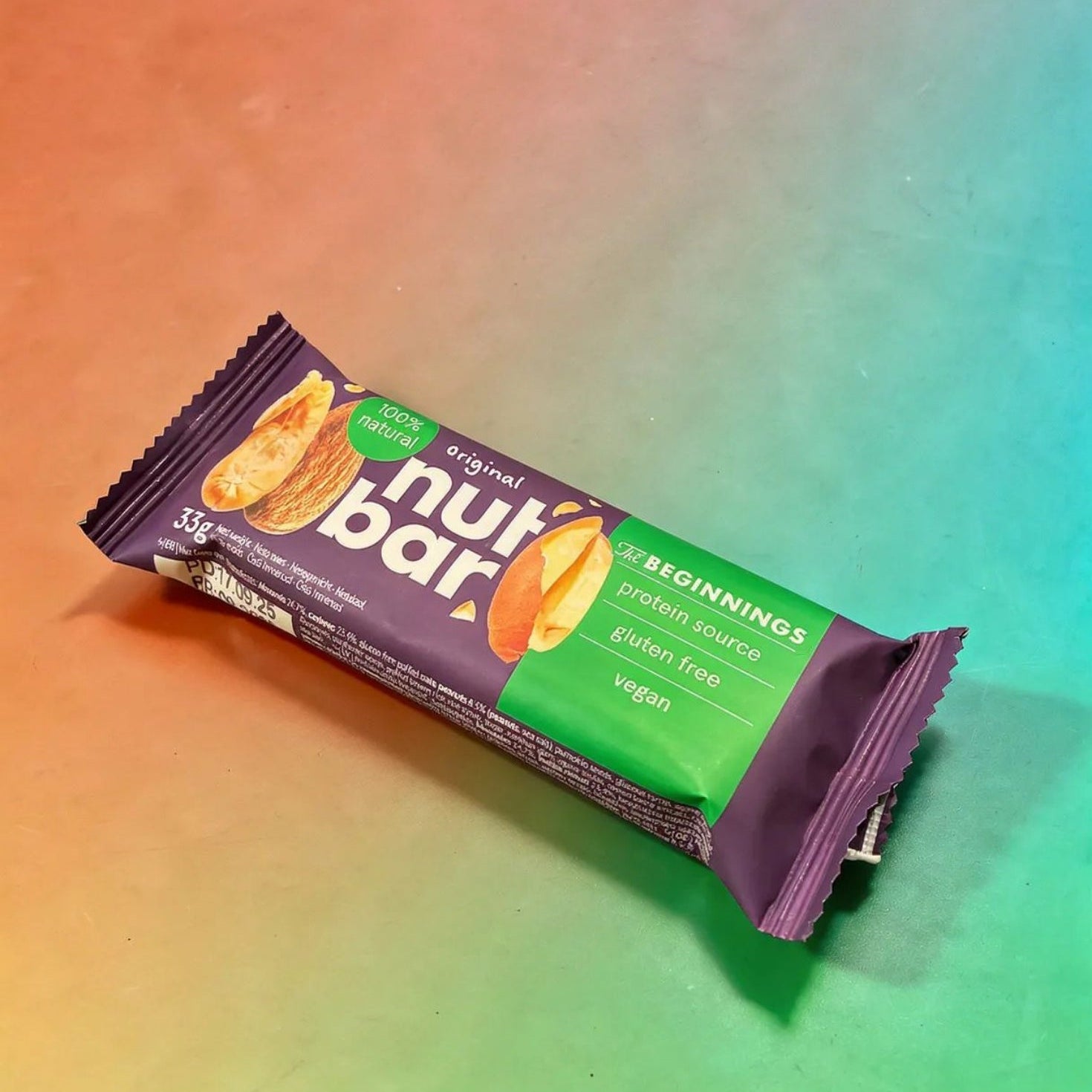 Illustration of The Beginnings Original Nut & Seed Bar with nuts and seeds visible in a natural, wholesome snack presentation.