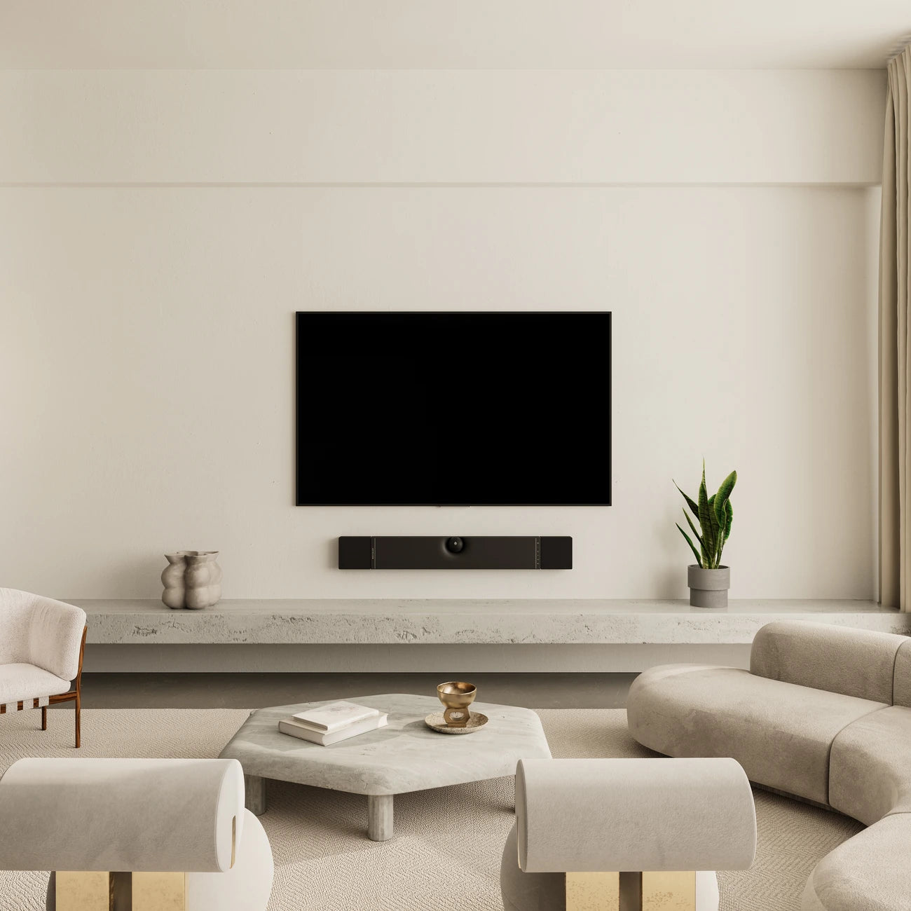 Devialet Dione soundbar mounted on wall in a modern living room, showcasing sleek black design and premium audio setup.