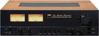 NAD C 3050 stereo amplifier with sleek black design and control knobs on the front panel.