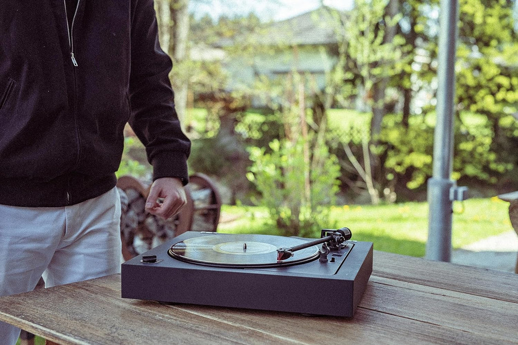 Pro-Ject Automat A2 turntable featuring a 2M Red cartridge, with a sleek black finish and modern design for high-quality vinyl playback.