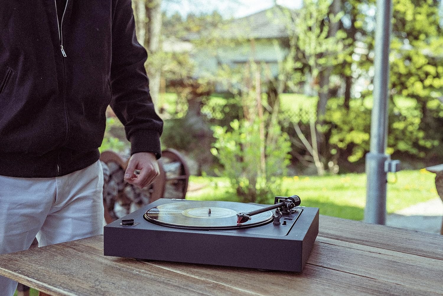 Pro-Ject Automat A2 turntable featuring a 2M Red cartridge, with a sleek black finish and modern design for high-quality vinyl playback.