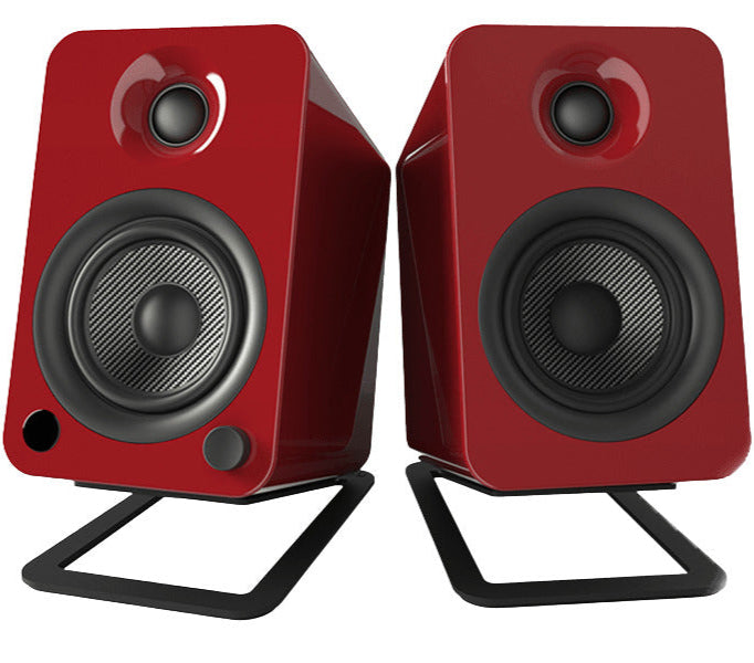 Kanto Audio S4 desktop speaker stands with sleek black design, supporting and elevating audio speakers for optimal sound quality.