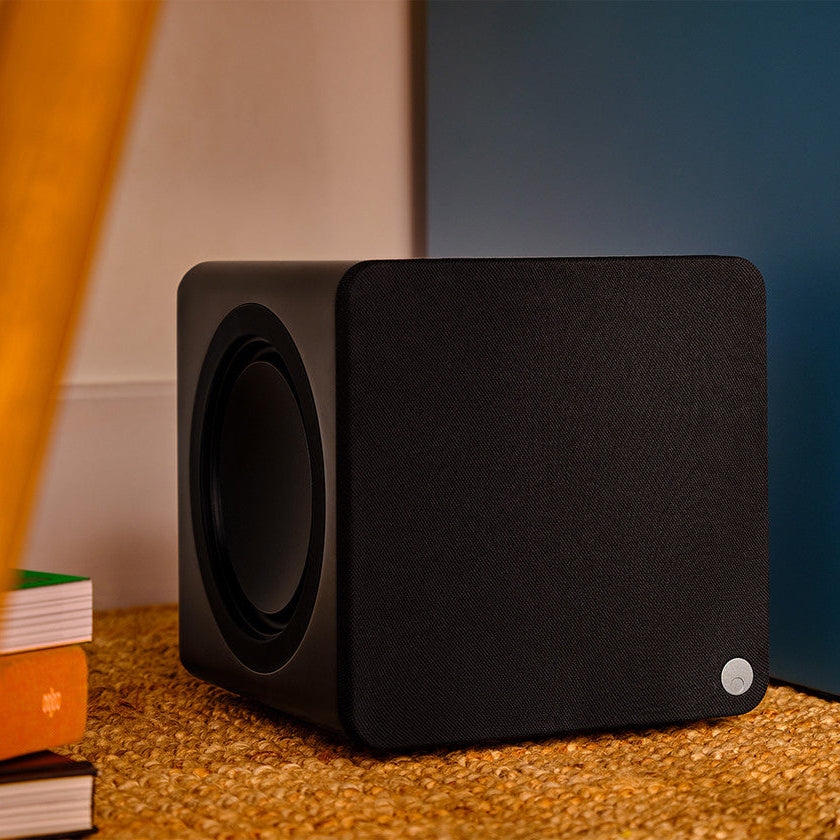 Cambridge Audio MSX Sub 200 subwoofer with sleek black design, showcasing its front grille and controls for enhanced bass performance.