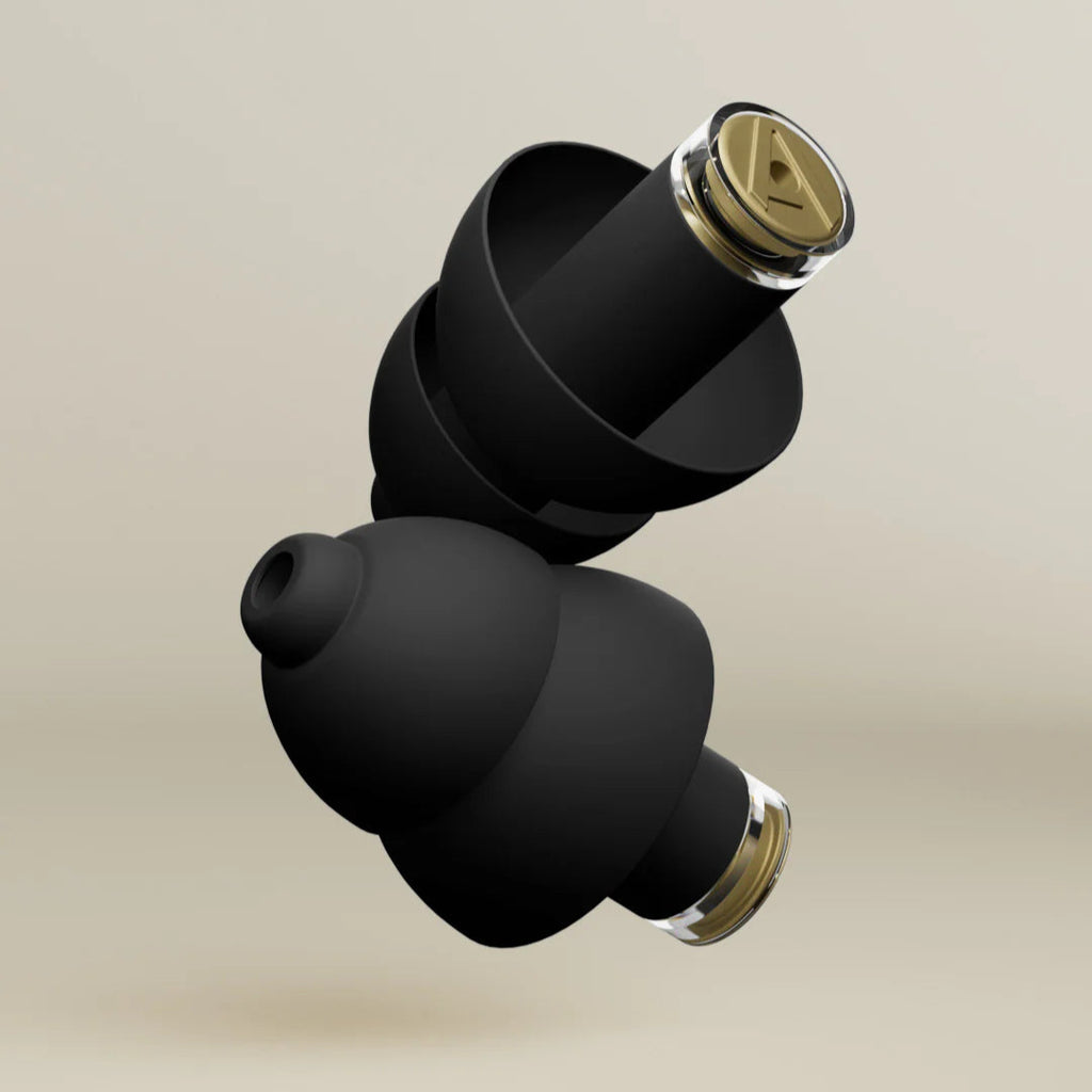 Black Alpine Music Safe Pro earplugs for hearing protection, shown in close-up with a sleek design.
