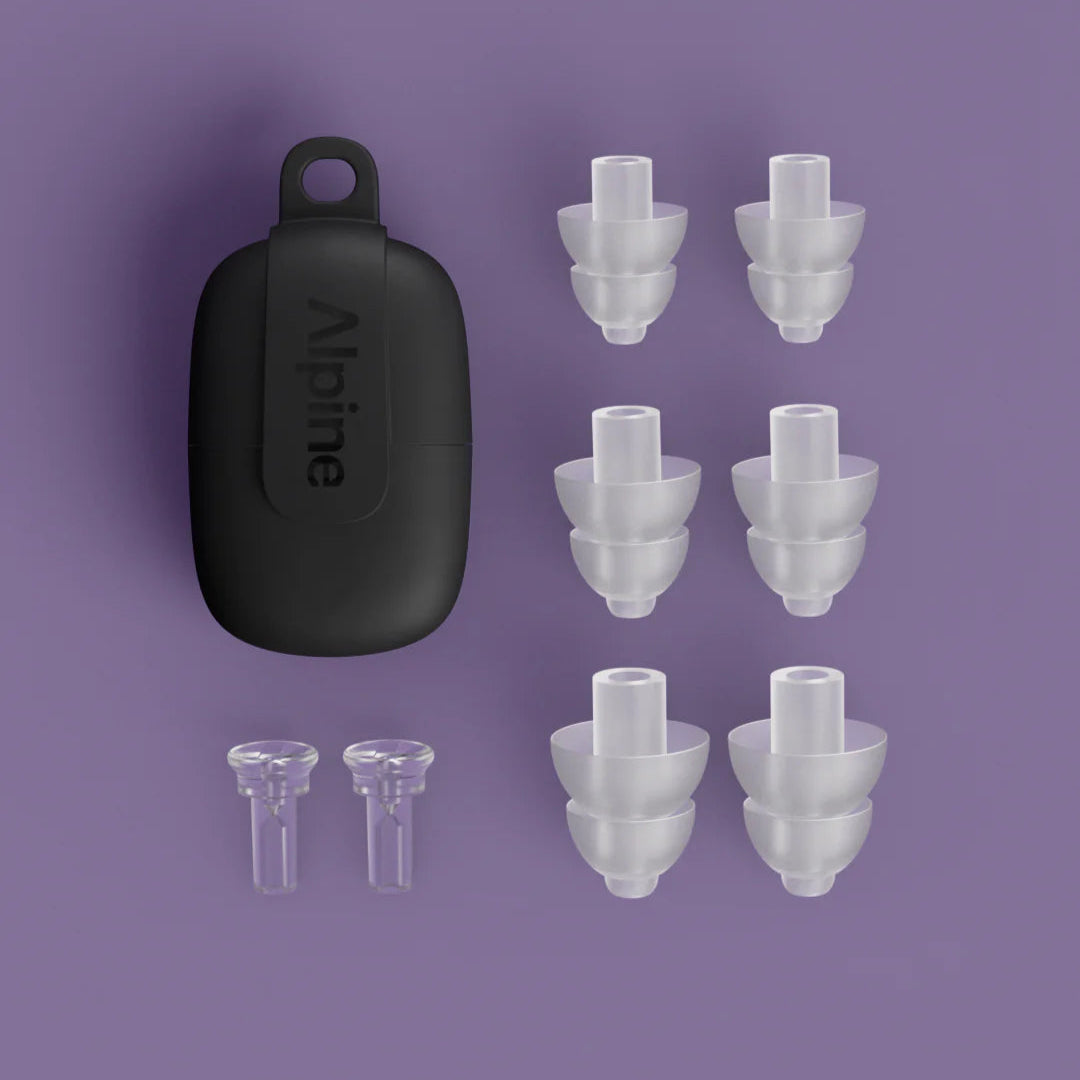 Alpine PartyPlug earplugs for hearing protection, shown in clear with tips for noise reduction and comfort.