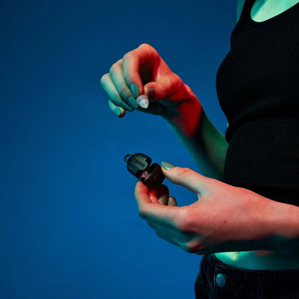 Alpine PartyPlug hearing protection earplugs in transparent case, designed for noise reduction at events and concerts.