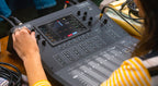 Alto Professional TMD16 digital mixer with multiple input channels and control knobs, ideal for live sound and recording setups.