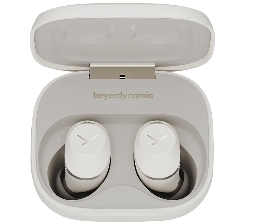 Beyerdynamic Amiron 300 wireless in-ear headphones in cream color, shown inside a protective case.