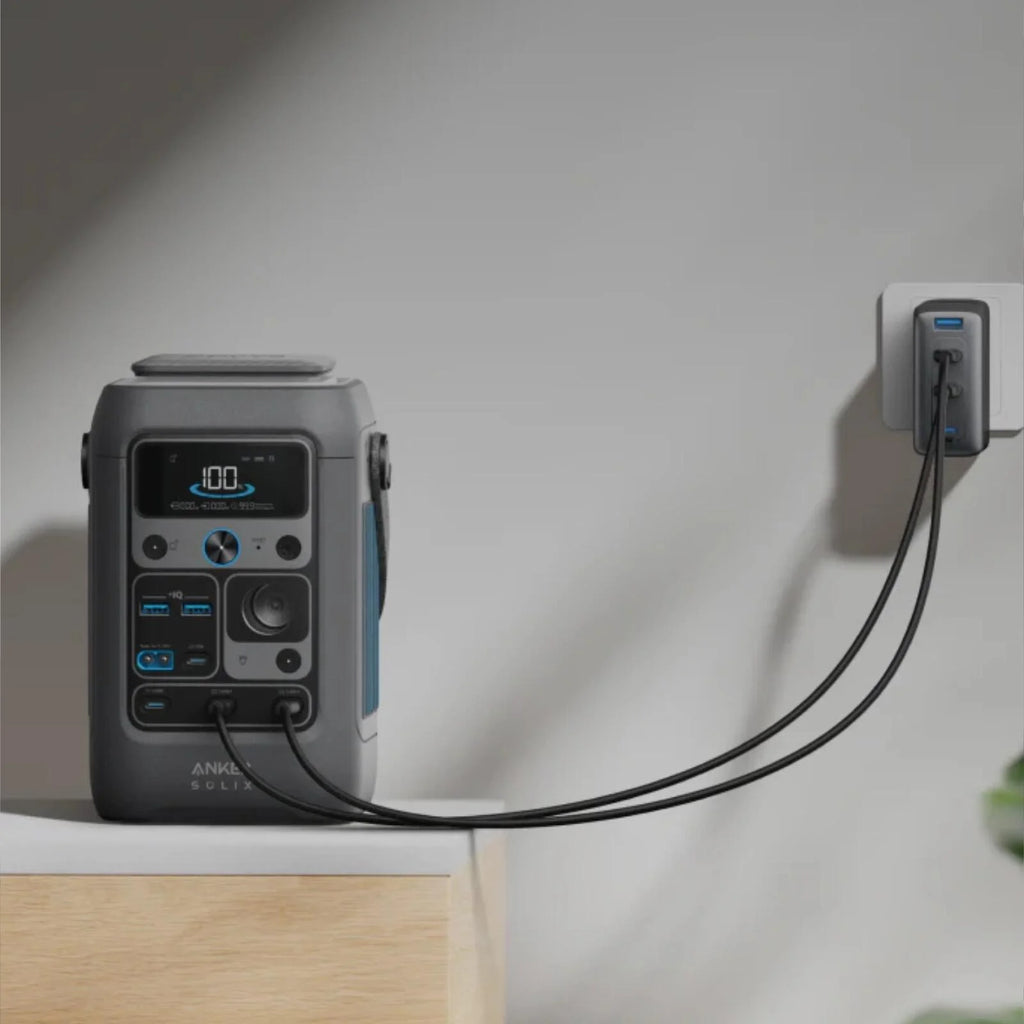 Anker Solix C300X DC portable power station with 288Wh capacity and multiple output ports for charging devices.