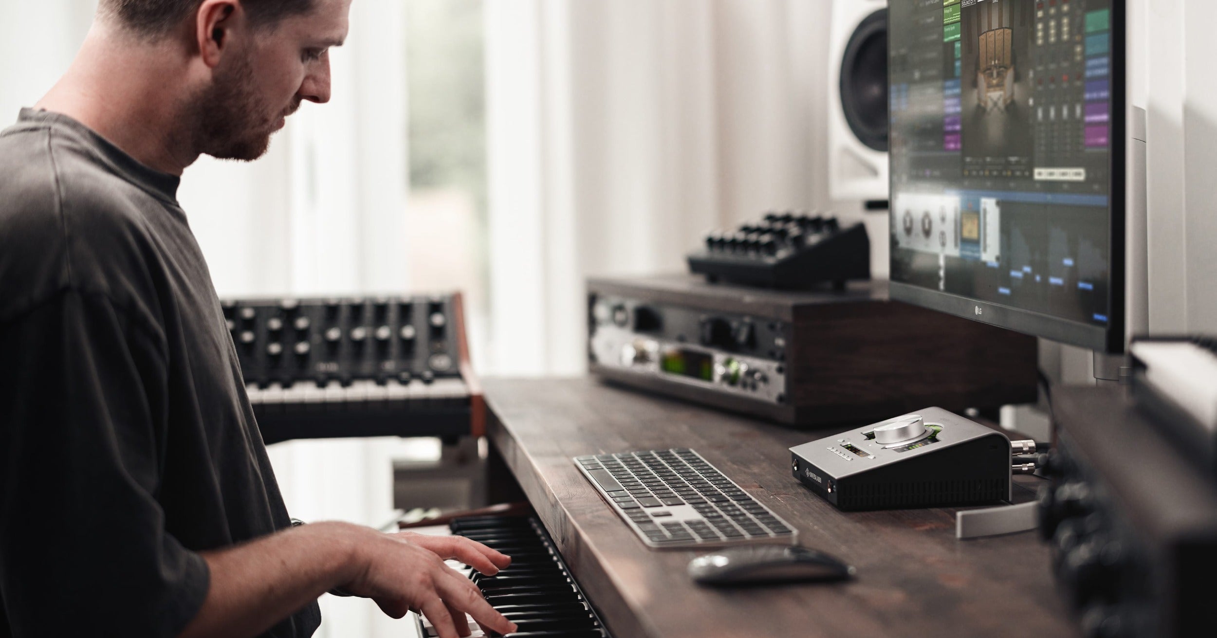 Universal Audio Apollo Twin X DUO Gen 2 audio interface with dual preamps and sleek design, showcasing front panel features.