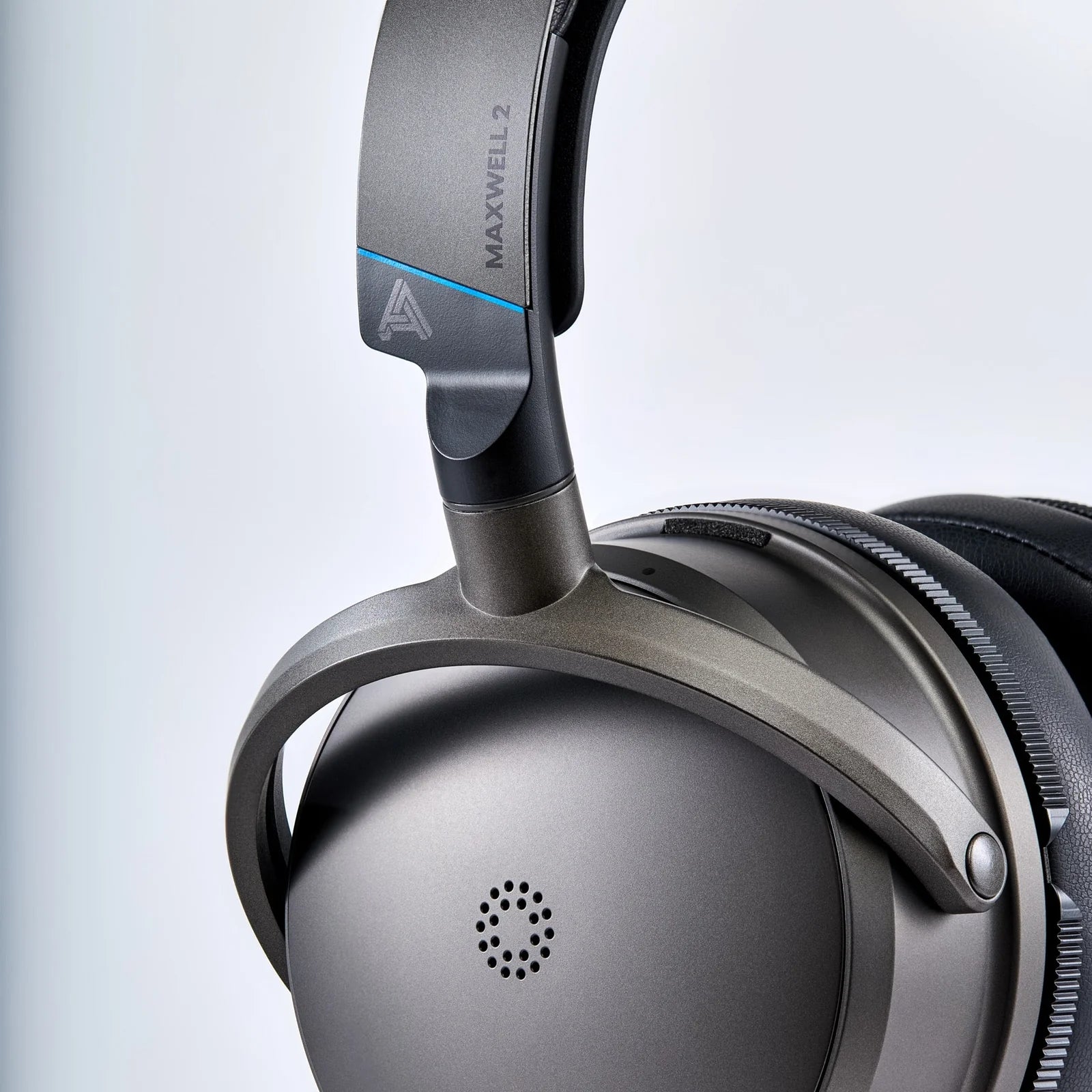 Audeze Maxwell 2 wireless gaming headphones for PlayStation, with over-ear design and built-in microphone, black color.