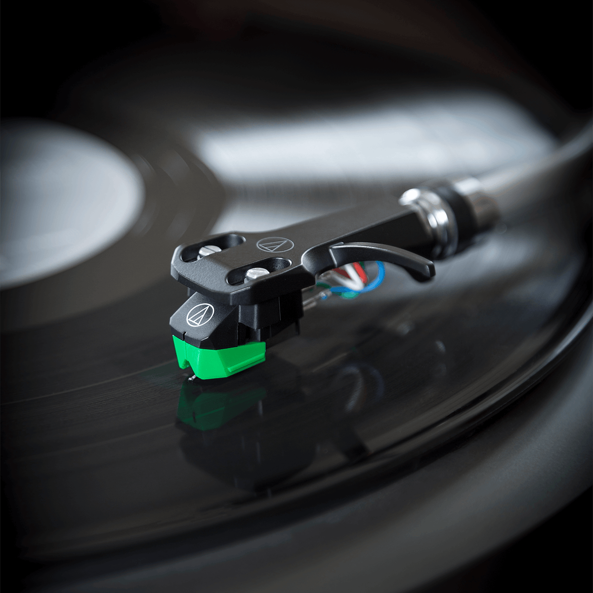 Audio Technica AT-VM95E turntable cartridge with stylus, detailed view of the Audio Technica record player accessory