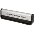 Audio Technica AT6011a anti-static record brush cleaning vinyl records to remove dust and static buildup.
