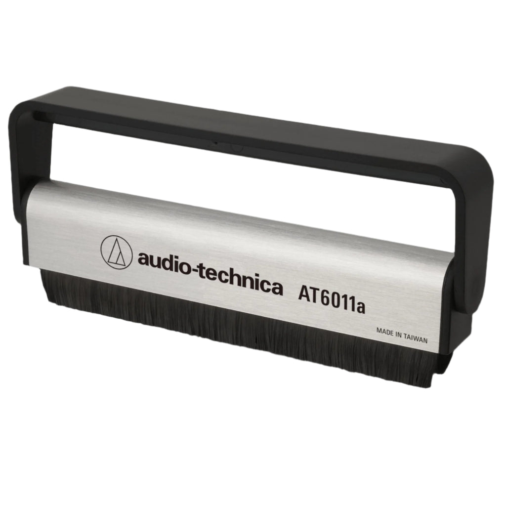 Audio Technica AT6011a anti-static record brush with soft bristles for cleaning vinyl records and reducing static buildup.