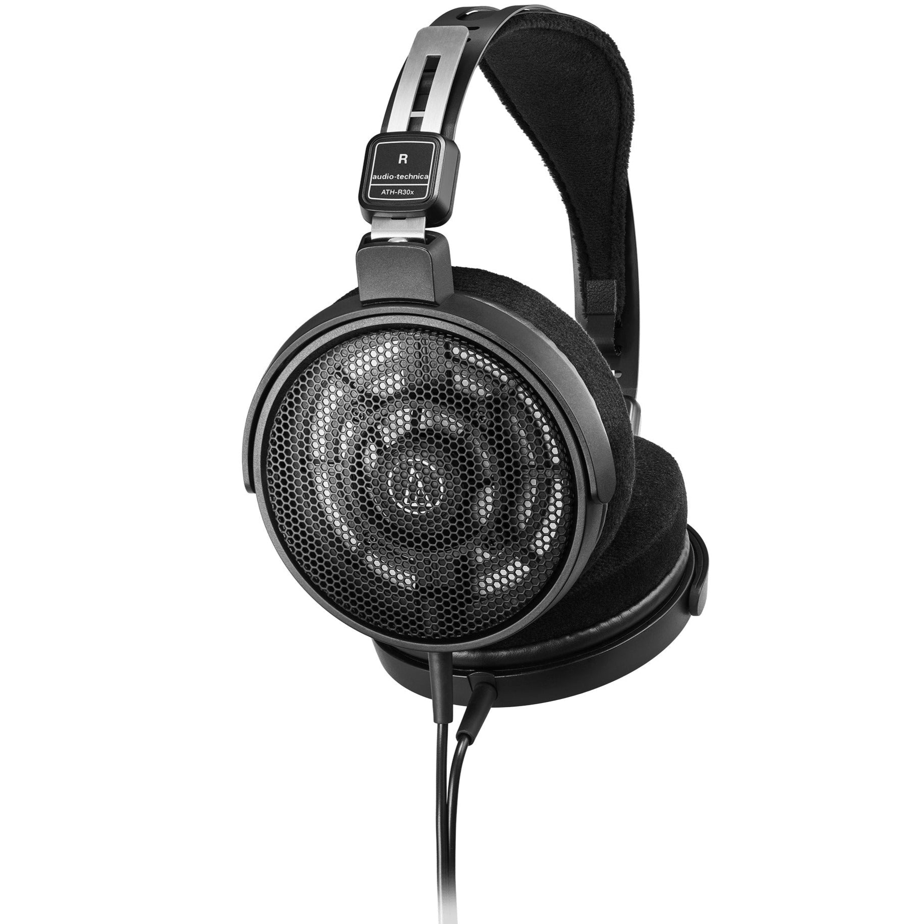 Audio Technica ATH-R30x studio headphones with large ear cups and adjustable headband, shown in a close-up side view.