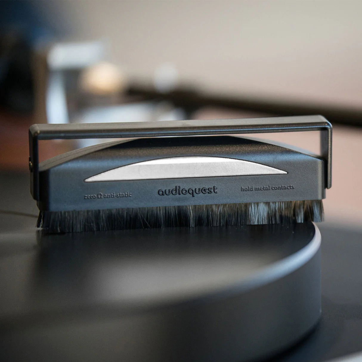 AudioQuest Silver Anti-Static Record Brush for cleaning vinyl records to reduce static and dust buildup.