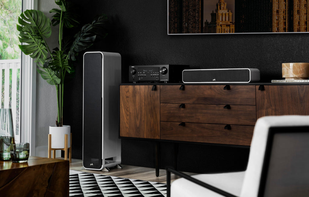 Denon AVR-S760H stereo amplifier with black front panel, multiple input ports, and control knobs on the front.