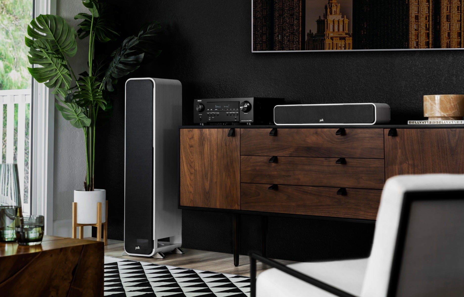 Denon AVR-S760H stereo amplifier with black front panel, multiple input ports, and control knobs on the front.