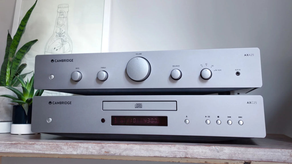 Cambridge Audio AXA25 stereo amplifier with sleek design and control knobs, ideal for high-quality audio listening.