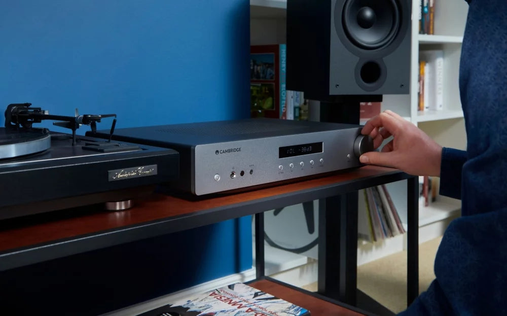 Cambridge Audio AXA35 stereo amplifier with sleek black design and front volume control, showcasing its modern audio equipment features.