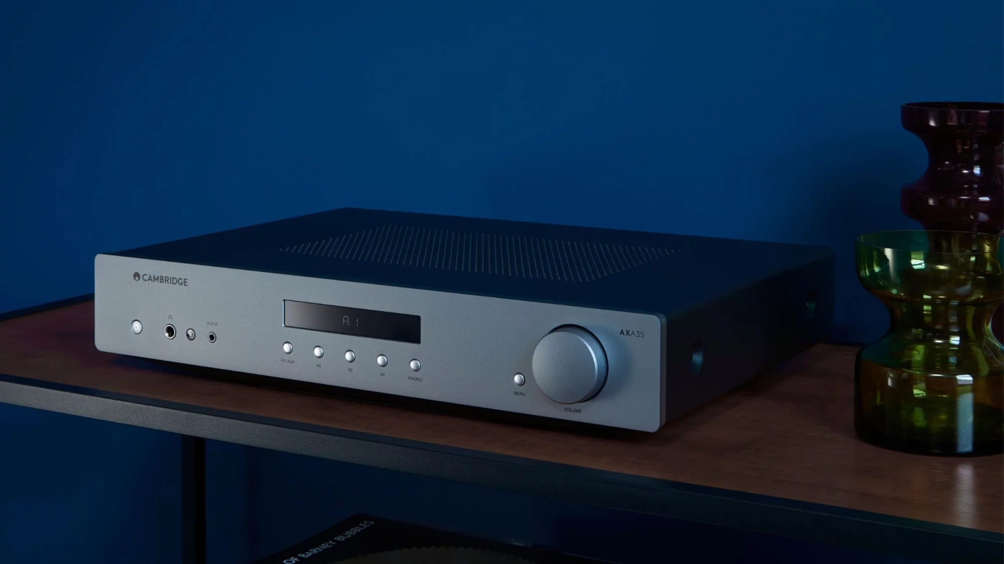 Cambridge Audio AXA35 stereo amplifier with sleek design and control knobs, showcasing high-quality audio equipment.