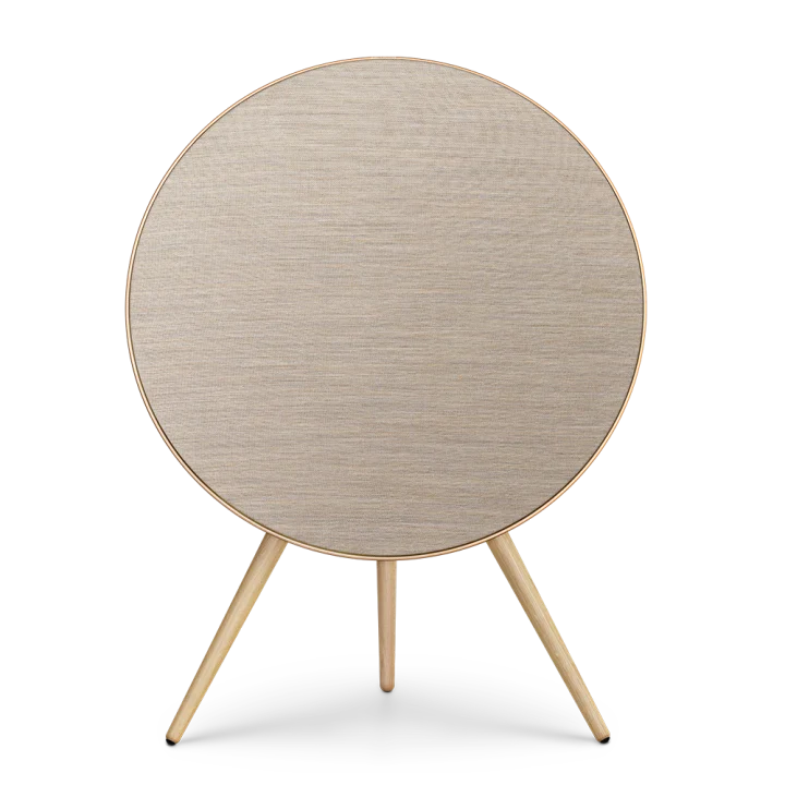 Bang & Olufsen Beosound A9 5th Gen wireless speaker in gold, showcasing its sleek, circular design with fabric-covered front.