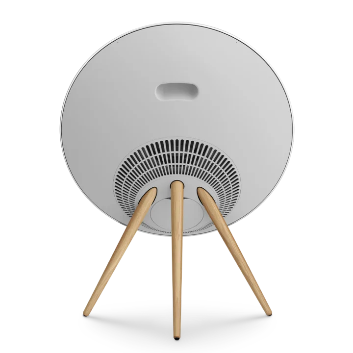 Bang & Olufsen Beosound A9 5th Gen wireless speaker in natural aluminum, showing its sleek, circular design and fabric covering.