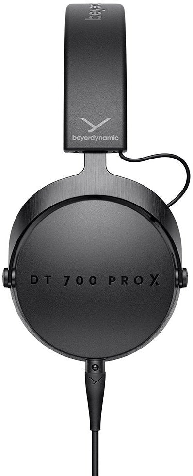 Beyerdynamic DT 700 Pro X studio headphones shown from the side, featuring over-ear design and professional audio equipment.
