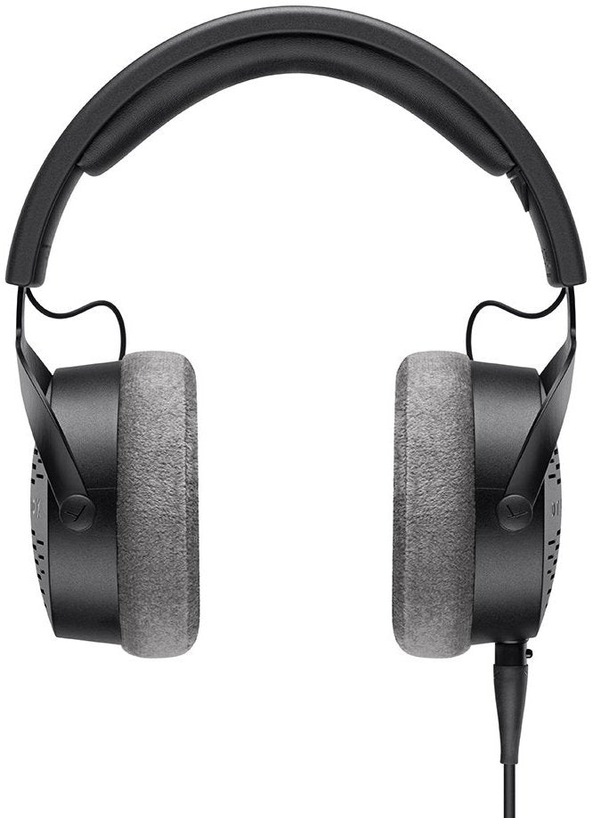 Beyerdynamic DT 900 Pro X studio headphones with over-ear design and adjustable headband, shown from the front angle.